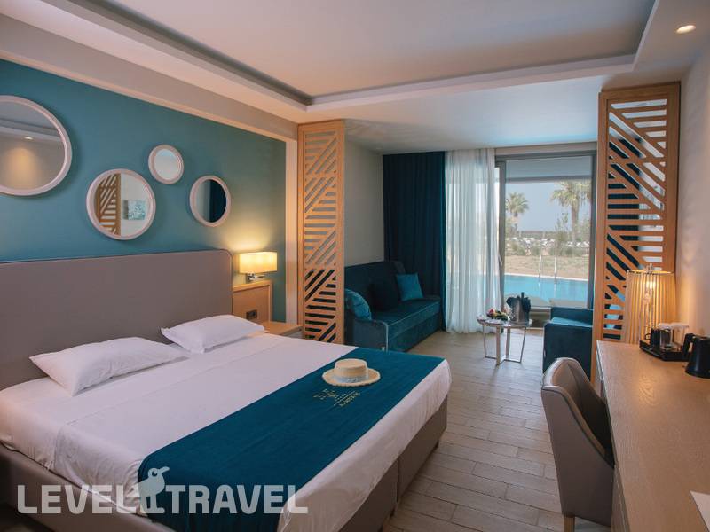 Фотография Almyros Beach Resort & Spa