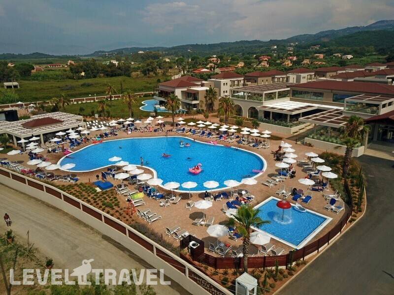 Фотография Almyros Beach Resort & Spa