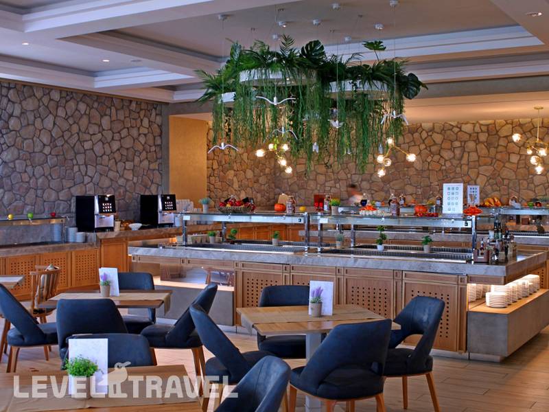 Фотография Almyros Beach Resort & Spa