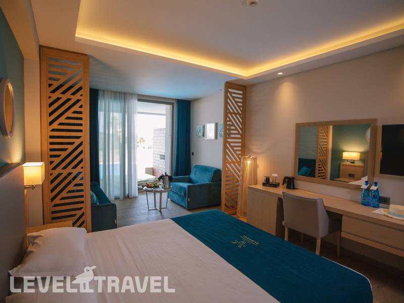 Фотография Almyros Beach Resort & Spa