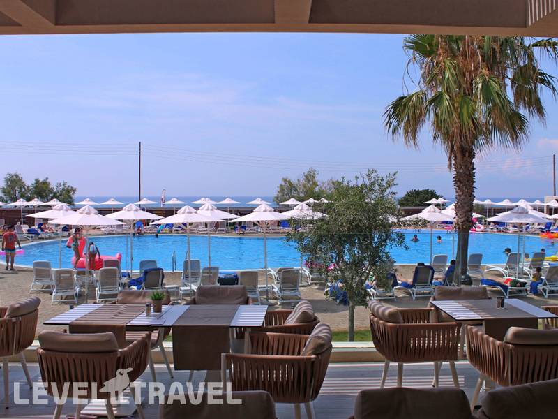 Фотография Almyros Beach Resort & Spa
