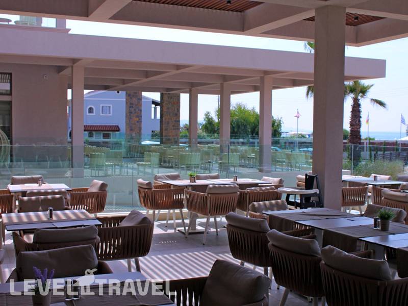Фотография Almyros Beach Resort & Spa