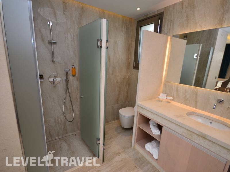 Фотография Almyros Beach Resort & Spa