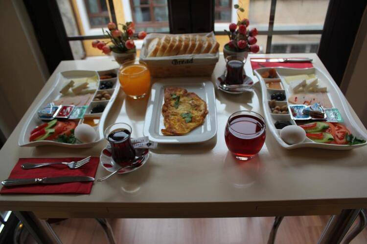 Zendy Suite Hotel