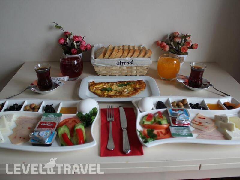 Фотография Zendy Suite Hotel