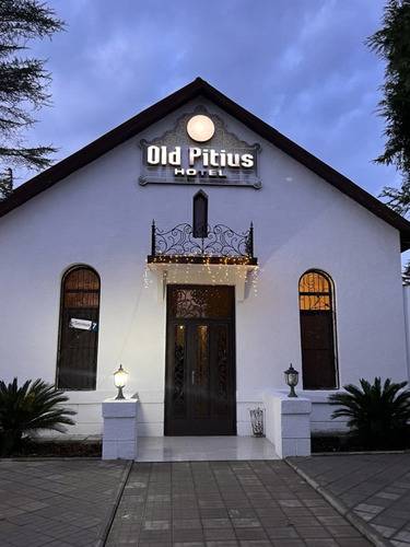 Отель Old Pitius