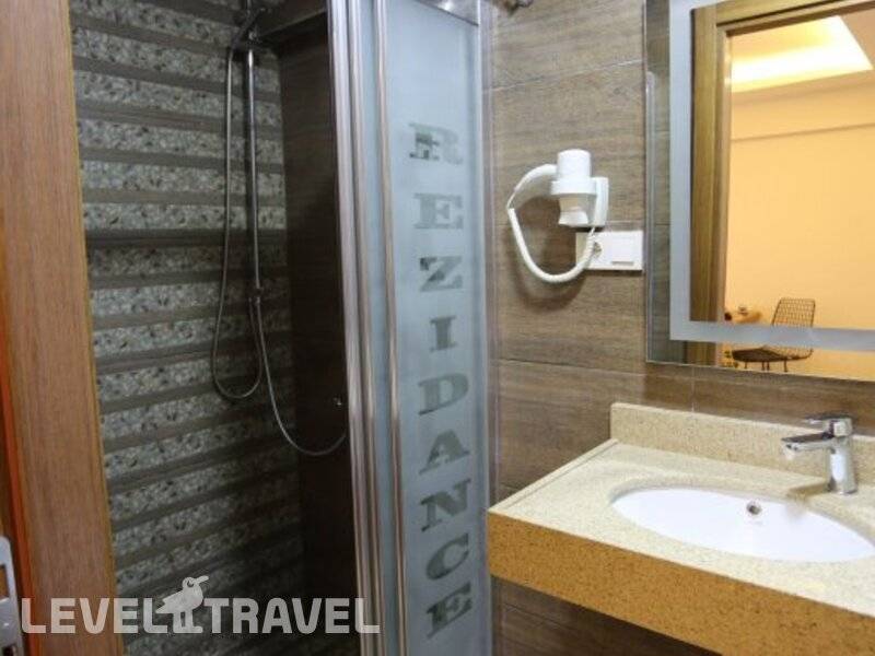 Фотография T-Square Residence