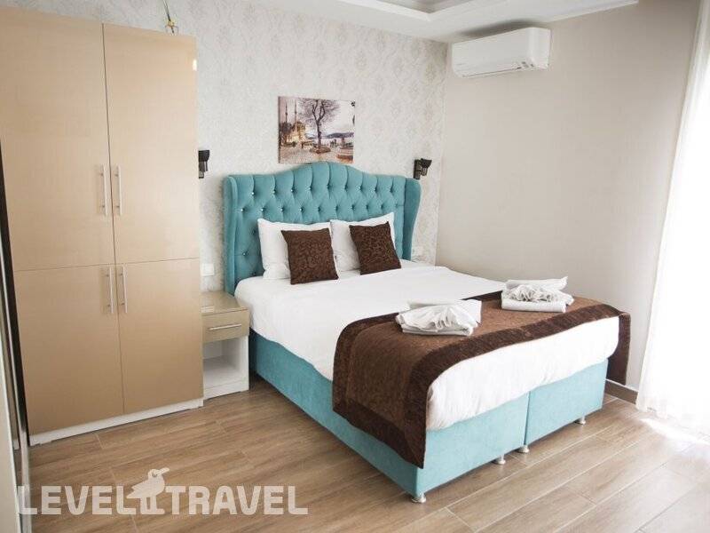 Фотография T-Square Residence