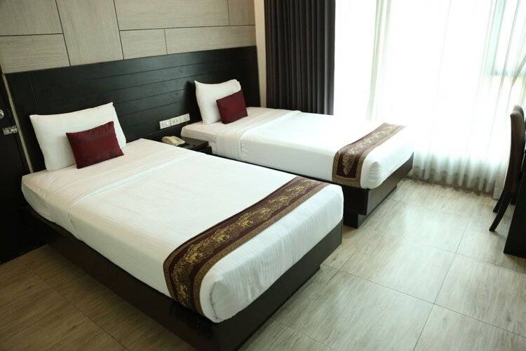 Boss Suites Nana Hotel