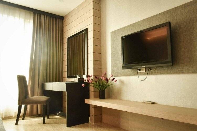Boss Suites Nana Hotel