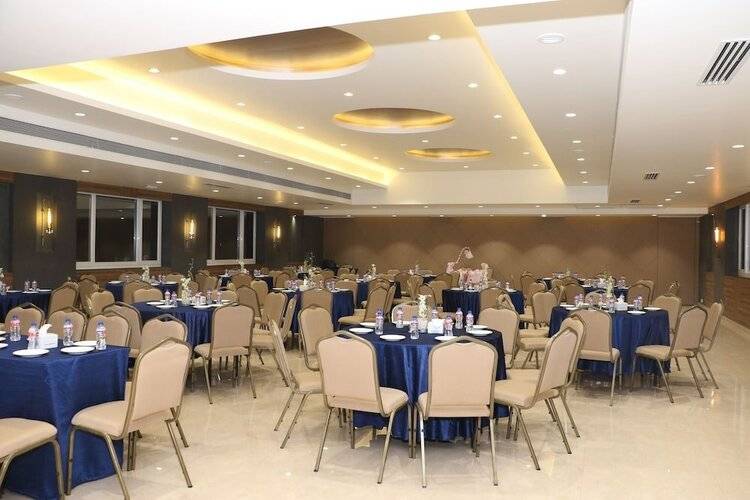 Cosmique Clarks Inn Suites