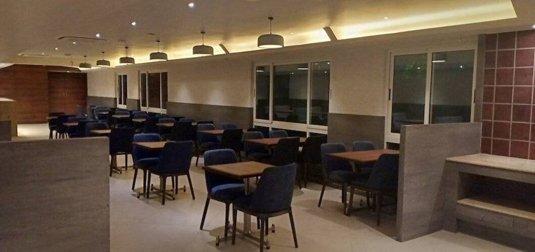 Cosmique Clarks Inn Suites