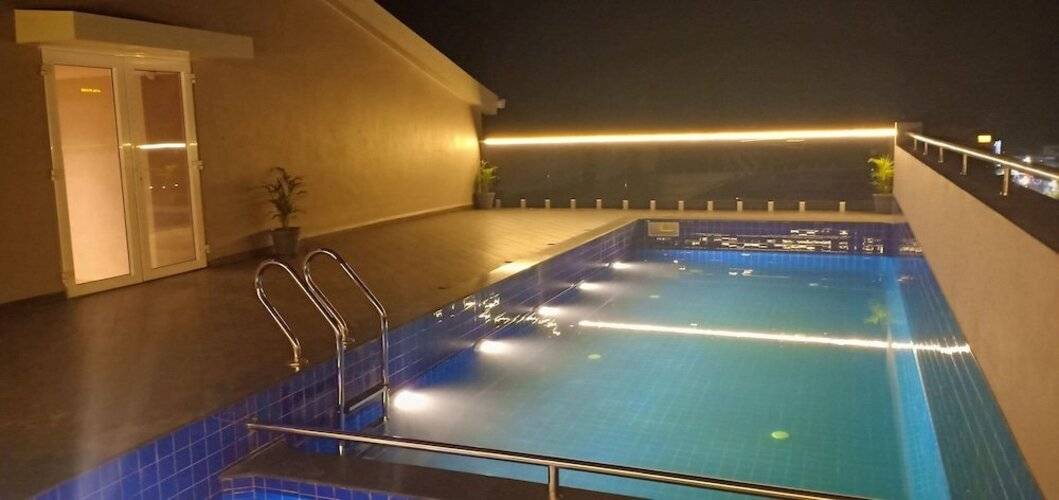 Cosmique Clarks Inn Suites