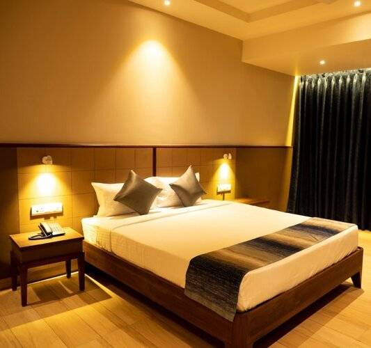 Cosmique Clarks Inn Suites
