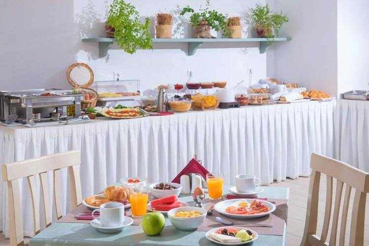 Astra Village Apartments & Suites