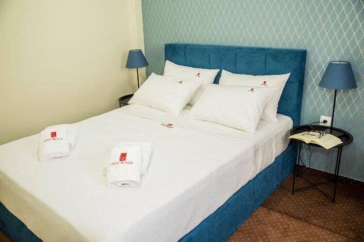 City Plaza Apartments & Rooms