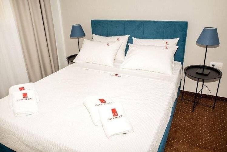 City Plaza Apartments & Rooms
