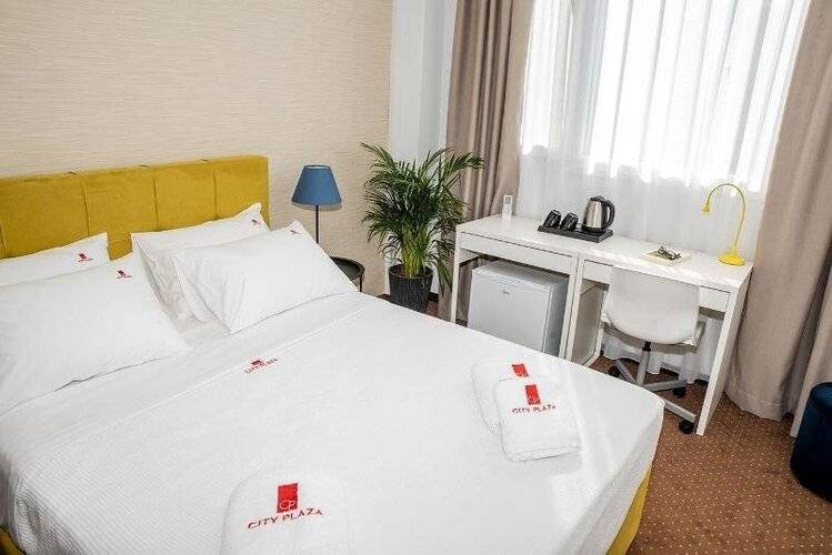 City Plaza Apartments & Rooms