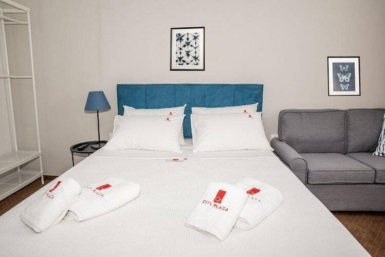 City Plaza Apartments & Rooms