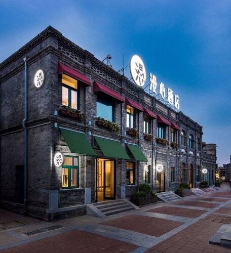 Manxin Qianmen Courtyard Hotel