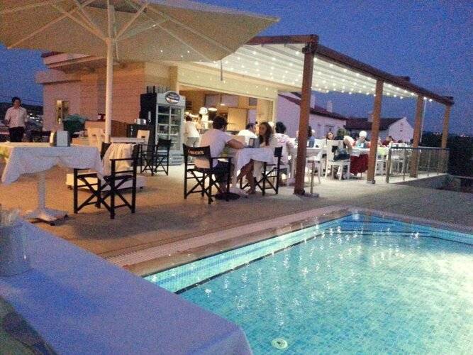 Kamer Suites & Hotel