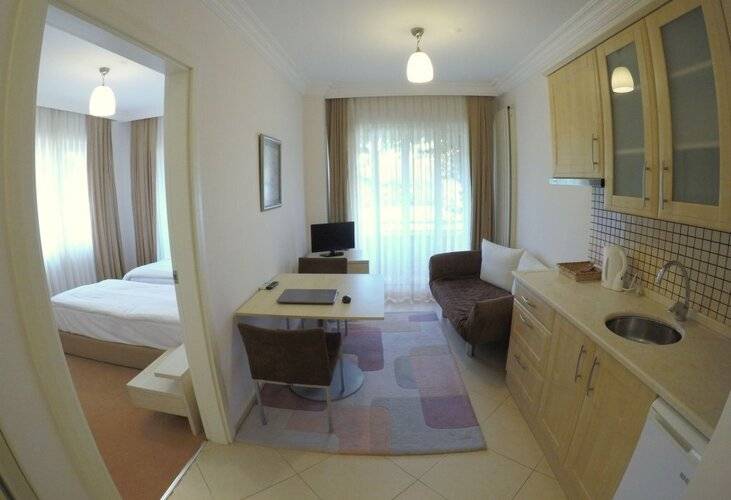 Kamer Suites & Hotel