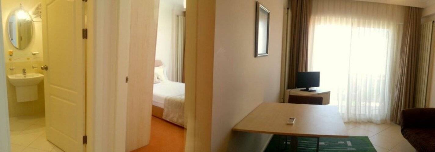 Kamer Suites & Hotel