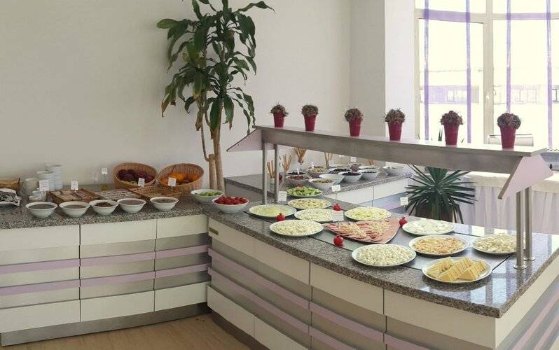 Kamer Suites & Hotel