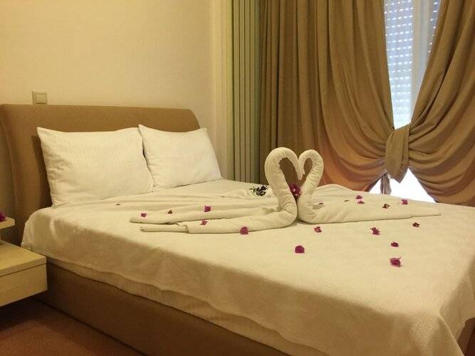 Kamer Suites & Hotel