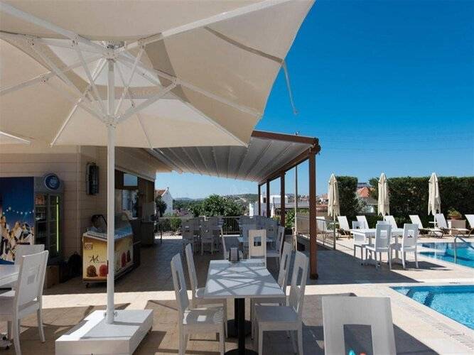 Kamer Suites & Hotel
