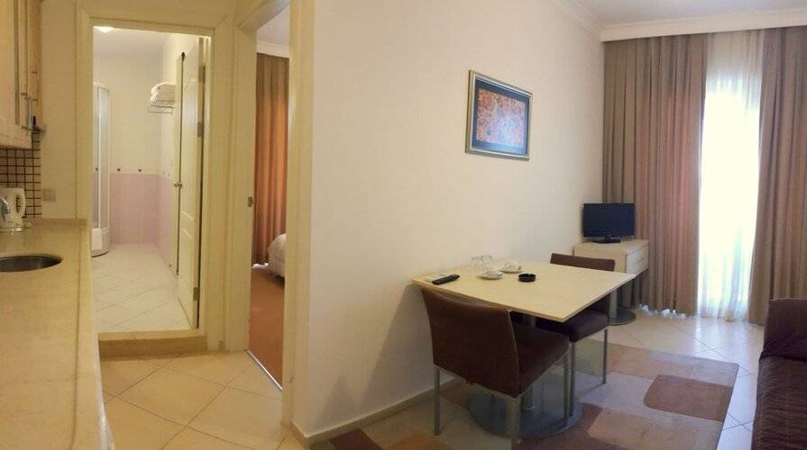 Kamer Suites & Hotel