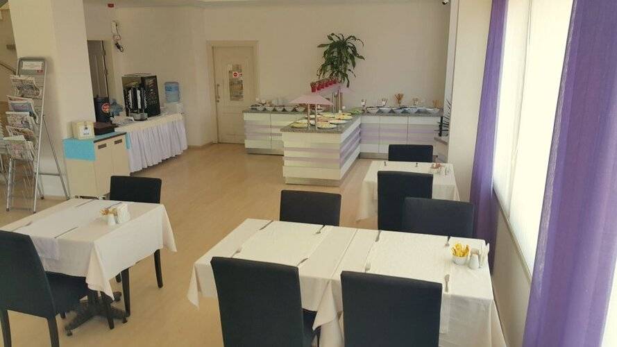 Kamer Suites & Hotel
