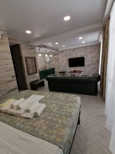 Апартаменты Holiday And Business Apartments