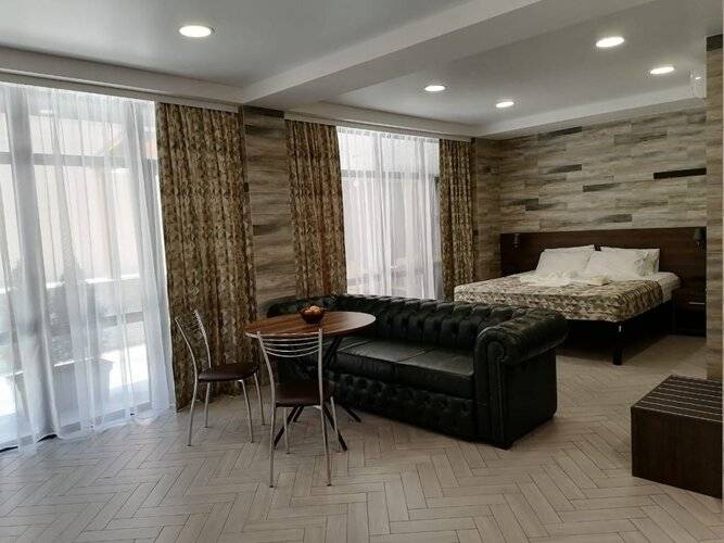 Апартаменты Holiday And Business Apartments