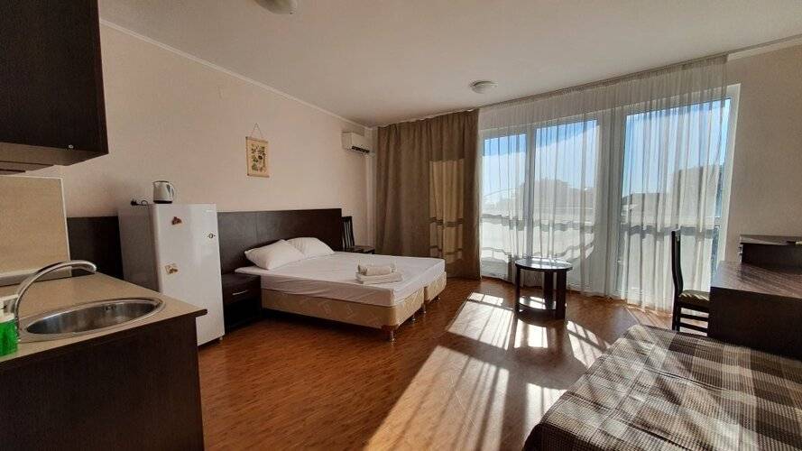 Апартаменты Уютная Студия На Кирпичной От Homehotelsochi