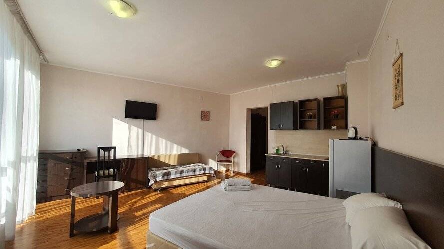 Апартаменты Уютная Студия На Кирпичной От Homehotelsochi