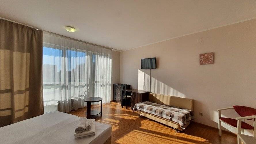 Апартаменты Уютная Студия На Кирпичной От Homehotelsochi