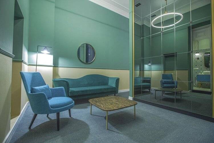 Heritage Hotel And Suites