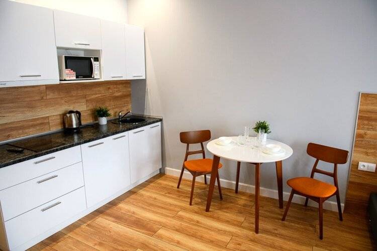 Верхнеторгова Площадь 4 Apartments
