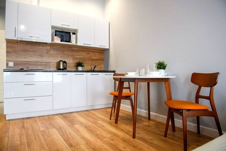 Верхнеторгова Площадь 4 Apartments