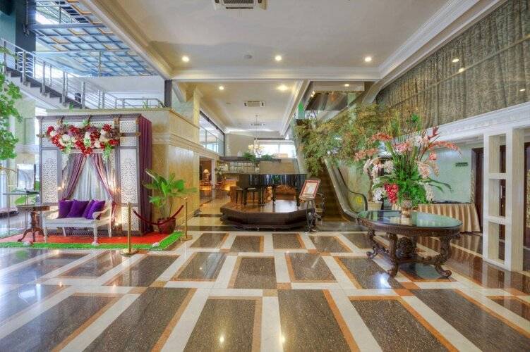 Amos Cozy Hotel & Convention Hall