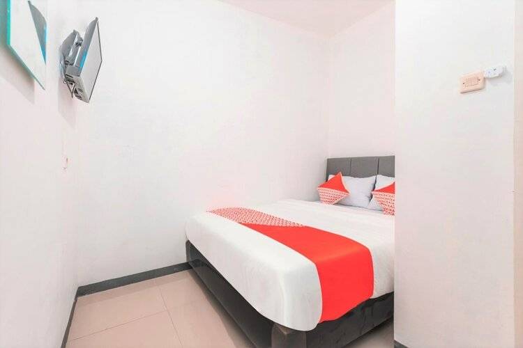 Super Oyo 2223 J&B Room Utan Kayu