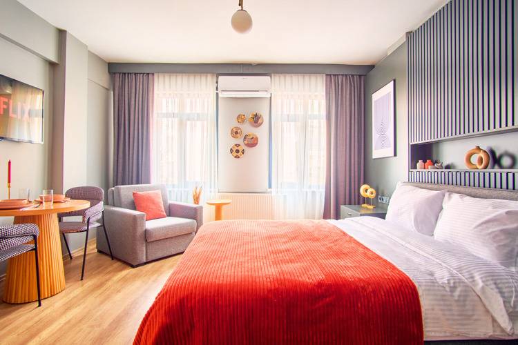Отель Taks-Inn Suites