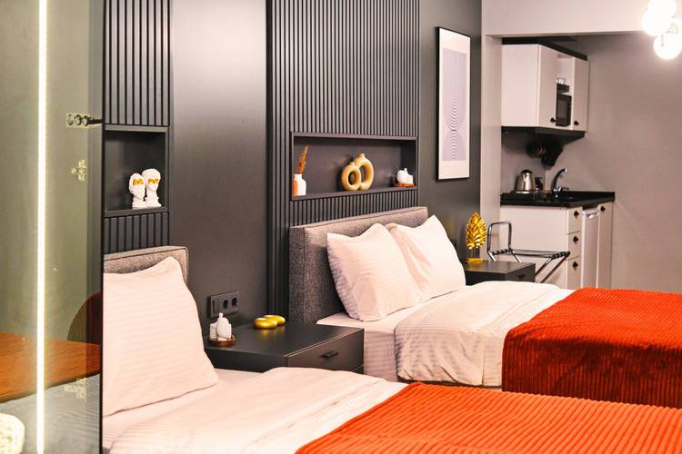 Отель Taks-Inn Suites