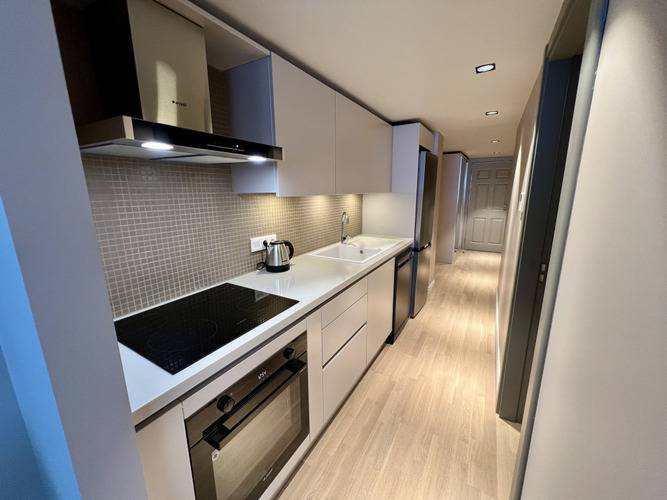 Отель Weingart Suites