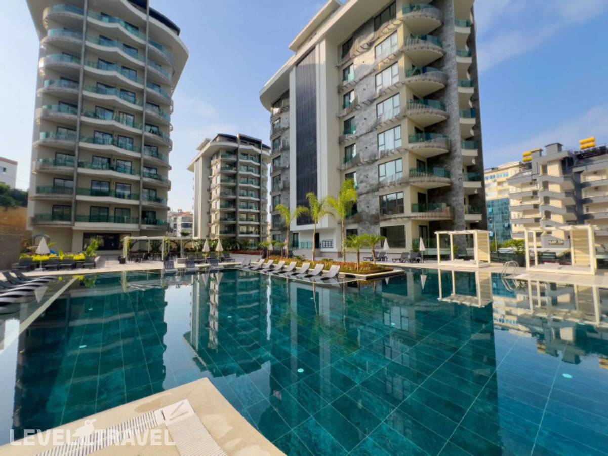 Отель Апартаменты 1+1 Qoople Excellence B19 В 100 М От Моря — Тосмур, Турция