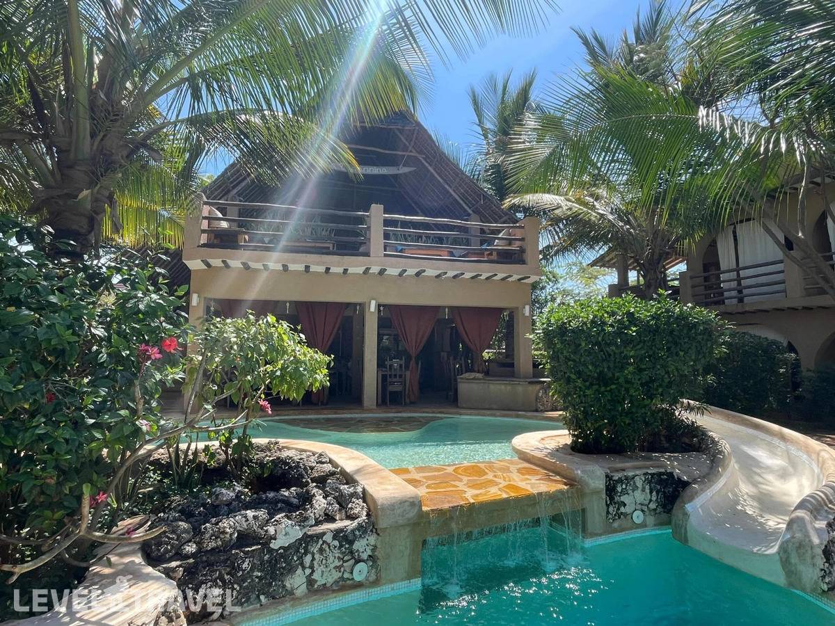 Отель Lapili Residence Apartments — Кивенгва Бич, Танзания