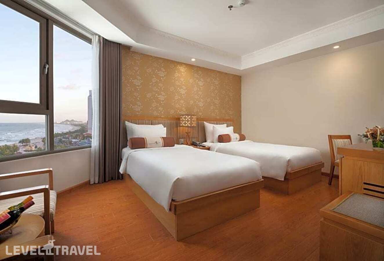 фотографии номера Премьер (две односпальные кровати) отеля Diamond Sea Hotel в Вьетнам(Дананг) - фото №1
