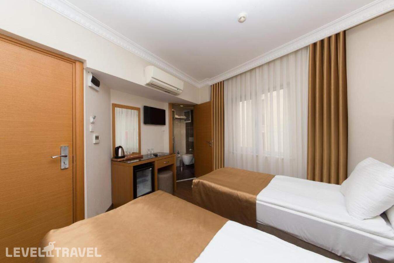 фотографии номера Стандартный (две односпальные кровати) отеля Aspalace Hotel в Турция(Фатих) - фото №2