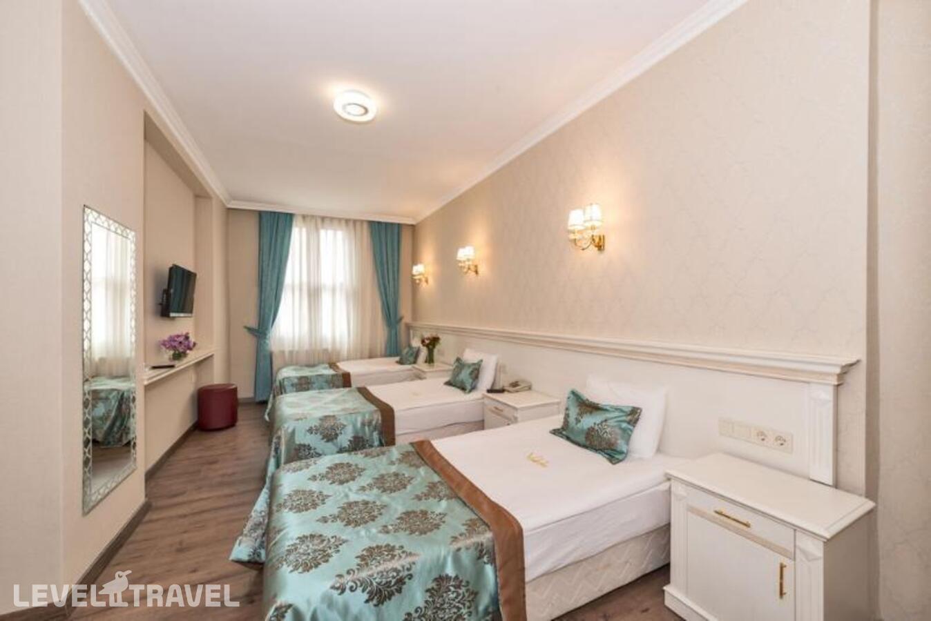 фотографии номера Трехместный с видом на город отеля Valide Hotel в Турция(Шишли) - фото №5